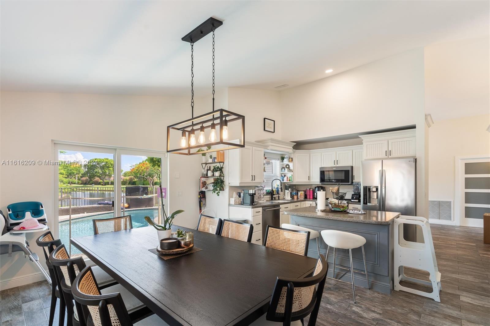 22397 Swordfish Drive Boca Raton, FL 33428 - Photo 8 of 20 a view of a dining room with furniture window and outside view