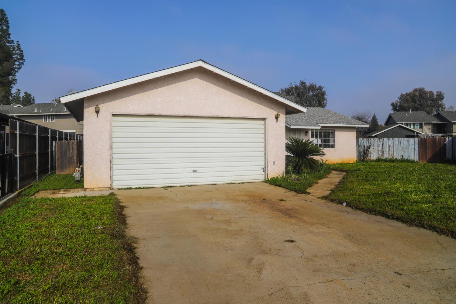 223 South Kady Avenue Reedley, CA 93654 - Photo 2 of 24 a view of garage and yard