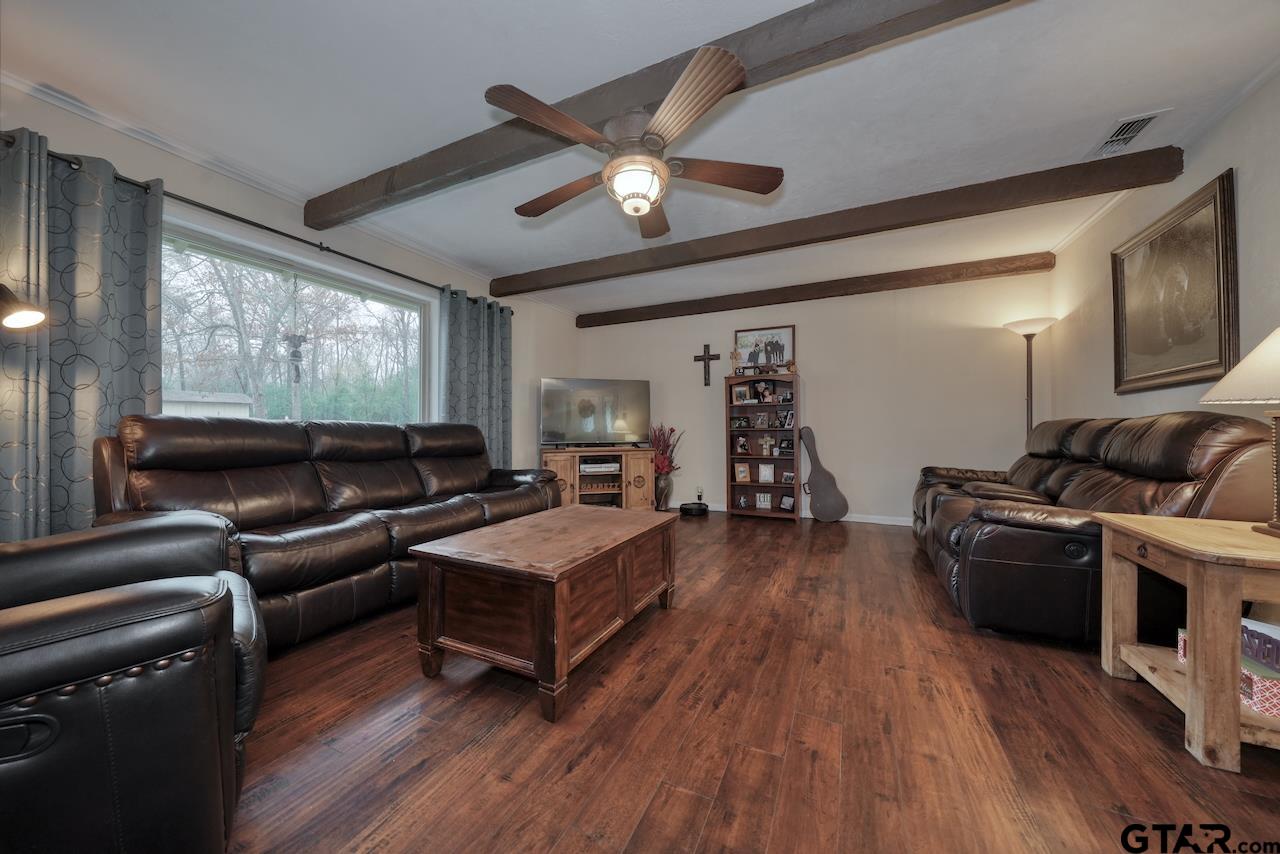 11656 Constantine Avenue Tyler, TX 75708 - Photo 6 of 26 a living room with furniture and a wooden floor