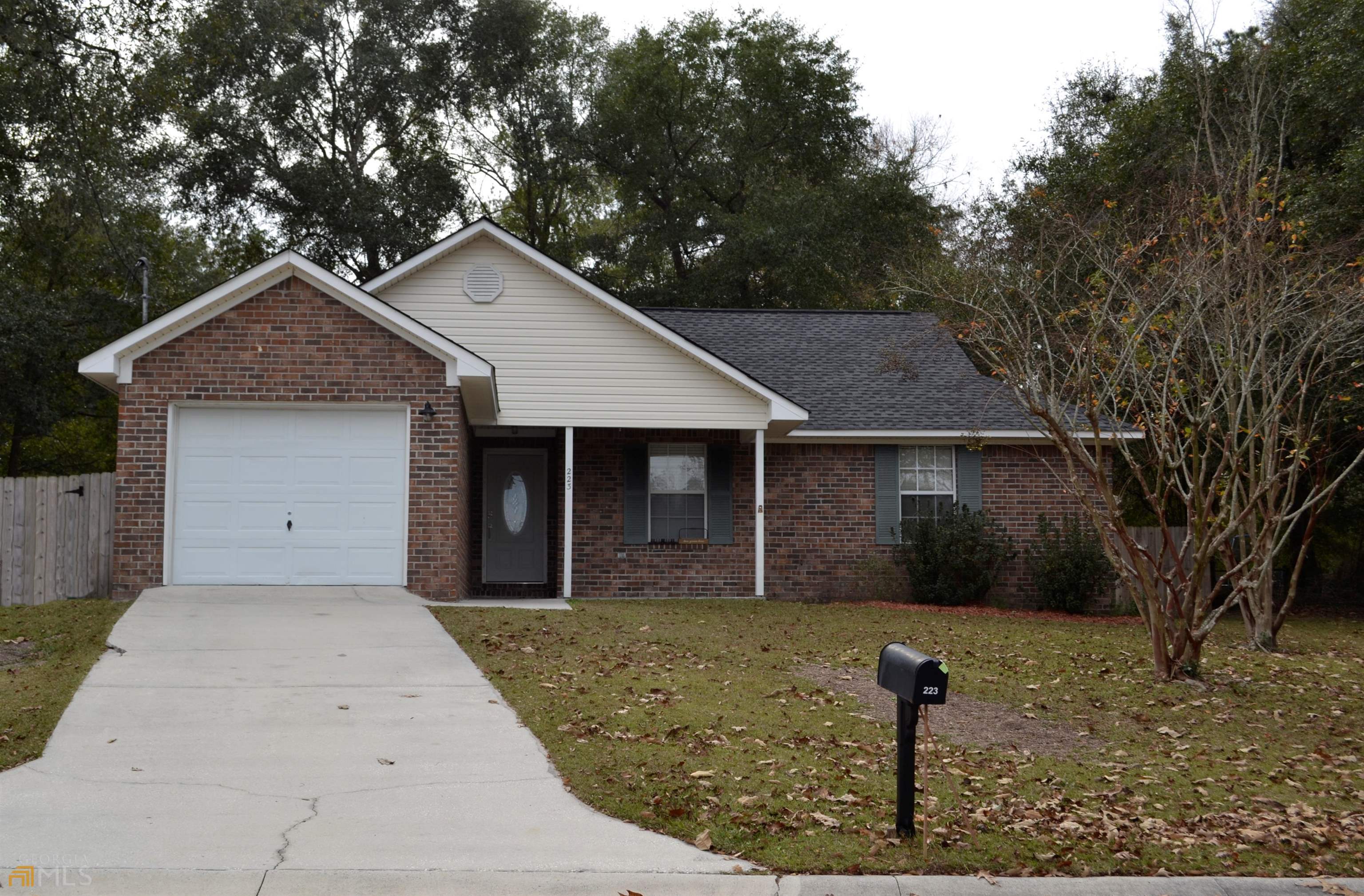 223 Fawn Court Springfield, GA 31329 - Photo 1 of 1 a front view of a house with garden