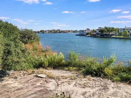 a view of a lake with houses