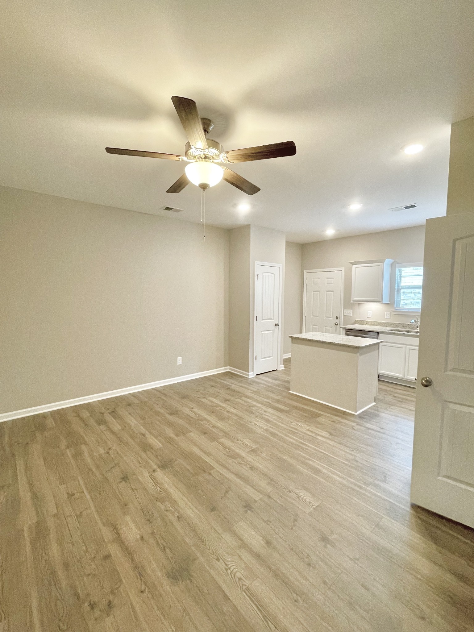 710 Rex Dr Spring Hill Spring Hill, TN 37174 - Photo 19 of 21 a view of kitchen with wooden floor and windows