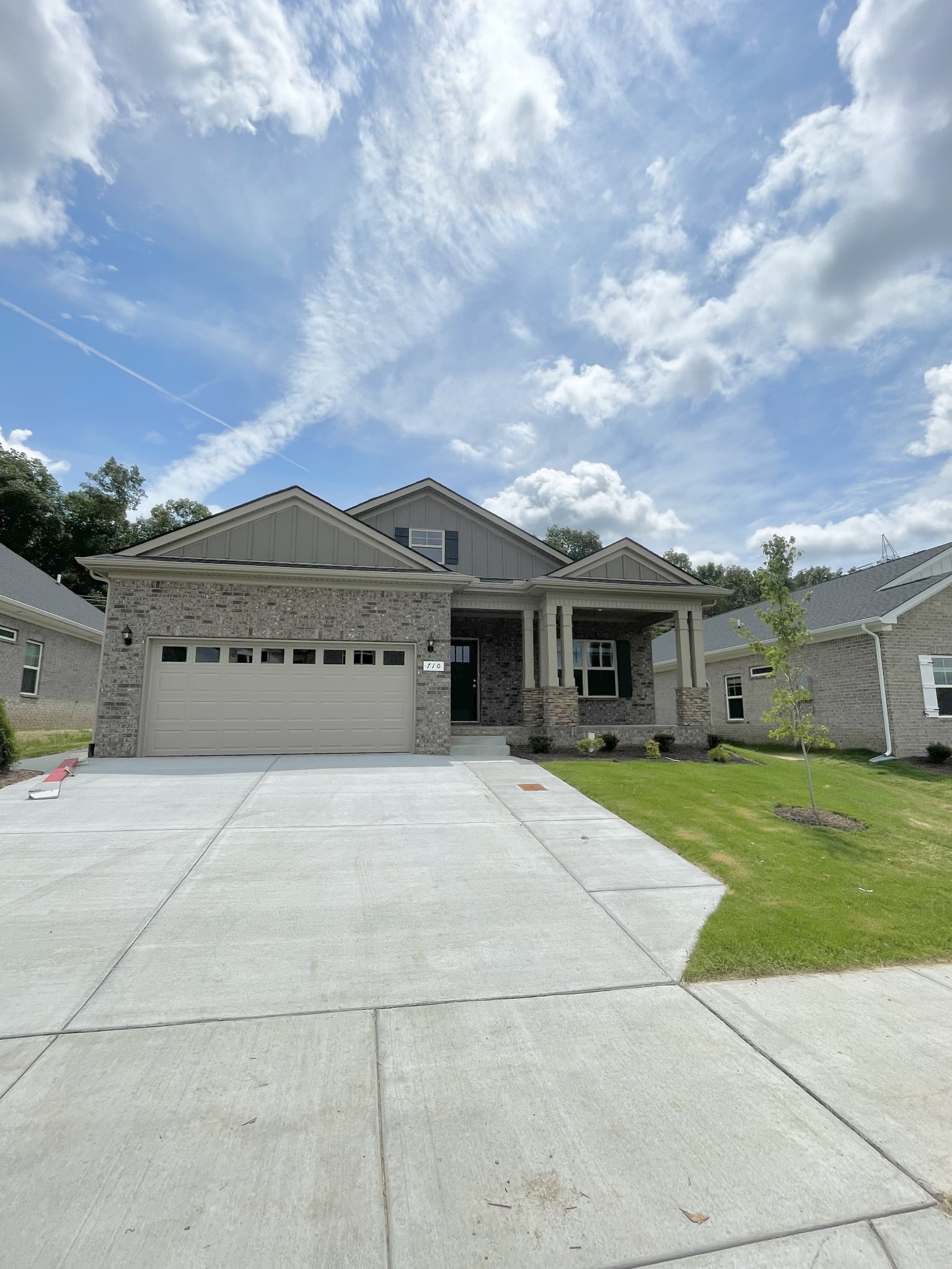 710 Rex Dr Spring Hill Spring Hill, TN 37174 - Photo 3 of 21 a front view of a house with garden