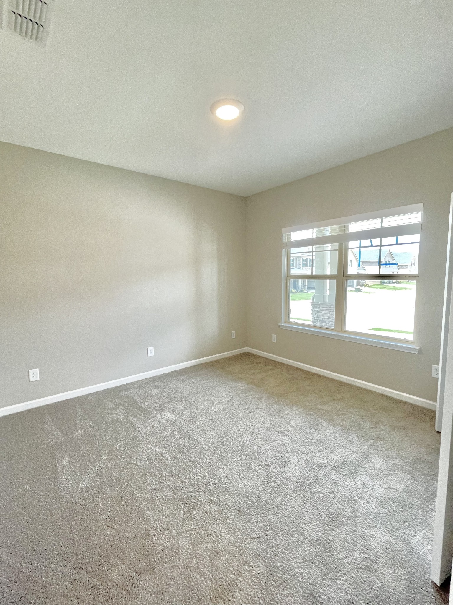 710 Rex Dr Spring Hill Spring Hill, TN 37174 - Photo 6 of 21 an empty room with windows