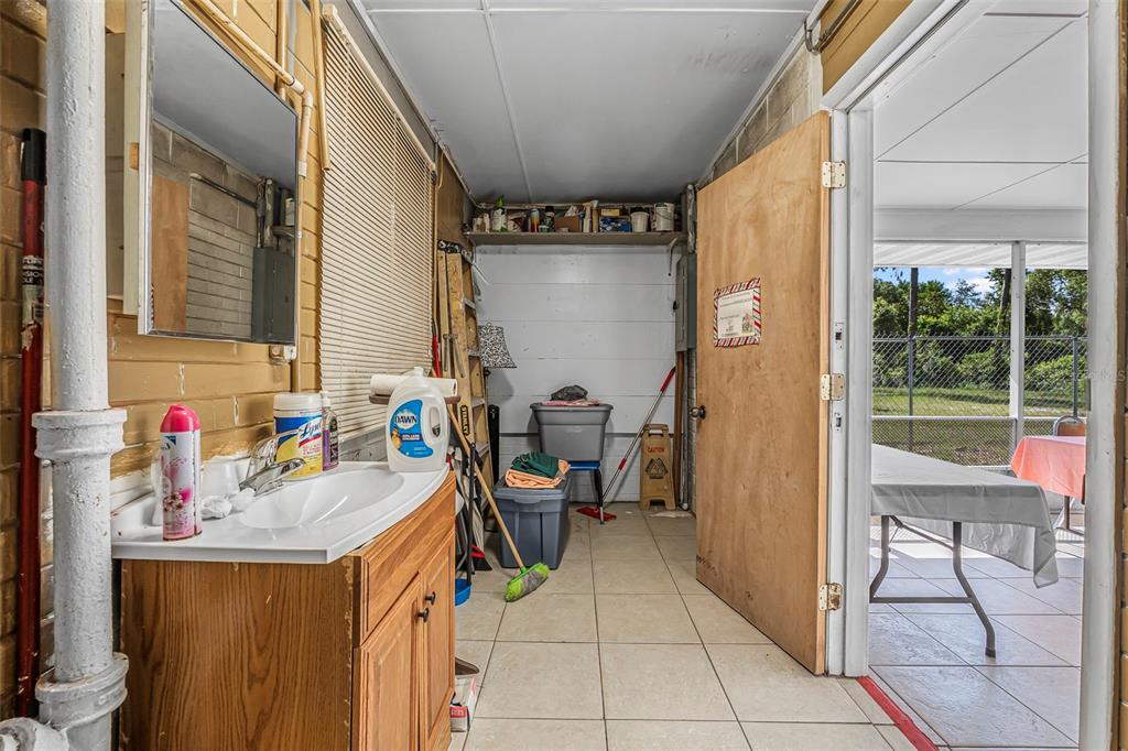2620 Doyle Road Deltona, FL 32738 - Photo 14 of 54 a view of storage and utility room