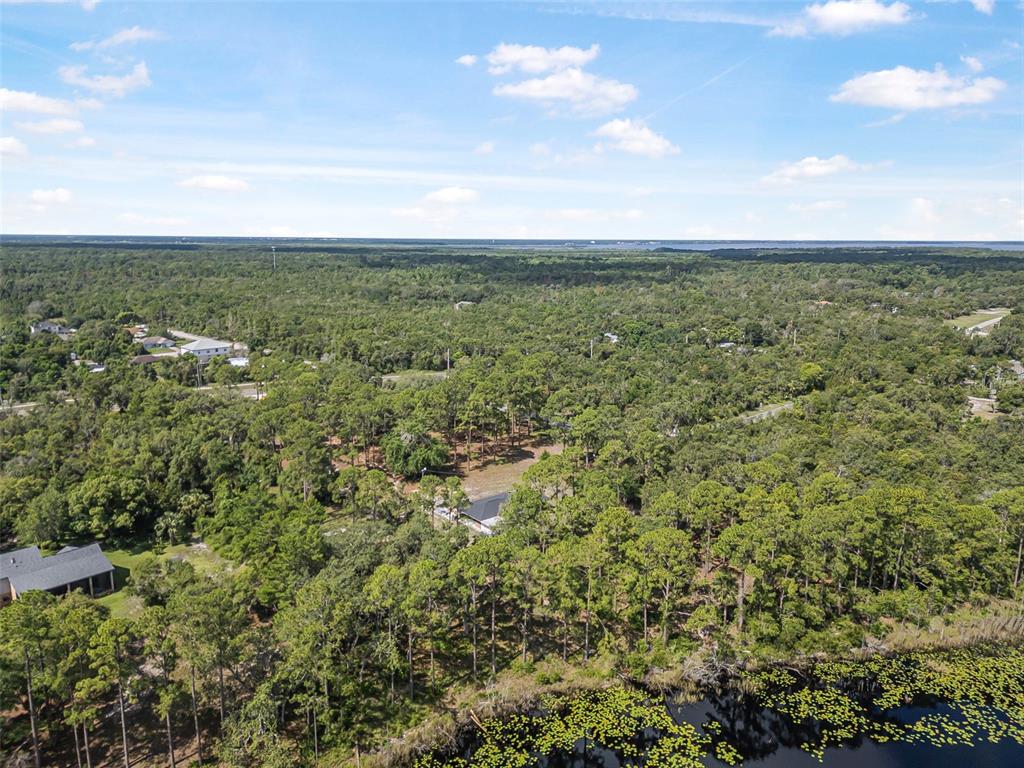 2620 Doyle Road Deltona, FL 32738 - Photo 20 of 54 a view of a field with an ocean