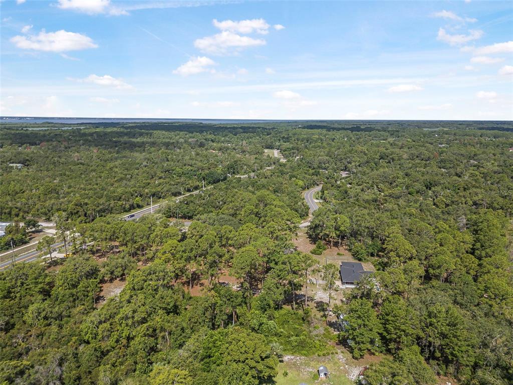 2620 Doyle Road Deltona, FL 32738 - Photo 21 of 54 a view of a field with an ocean