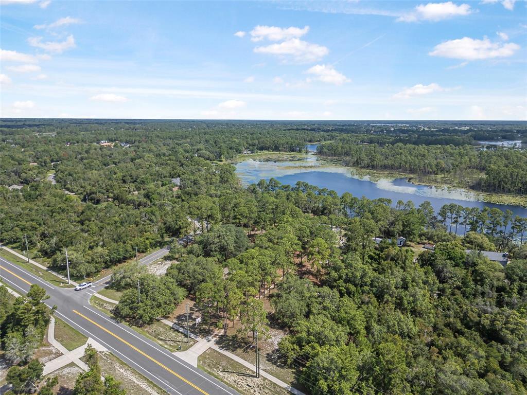 2620 Doyle Road Deltona, FL 32738 - Photo 22 of 54 a view of a green field