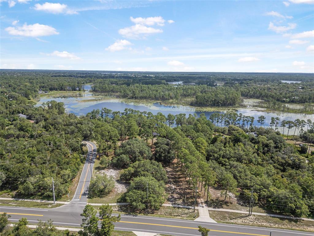 2620 Doyle Road Deltona, FL 32738 - Photo 23 of 54 an aerial view of a city