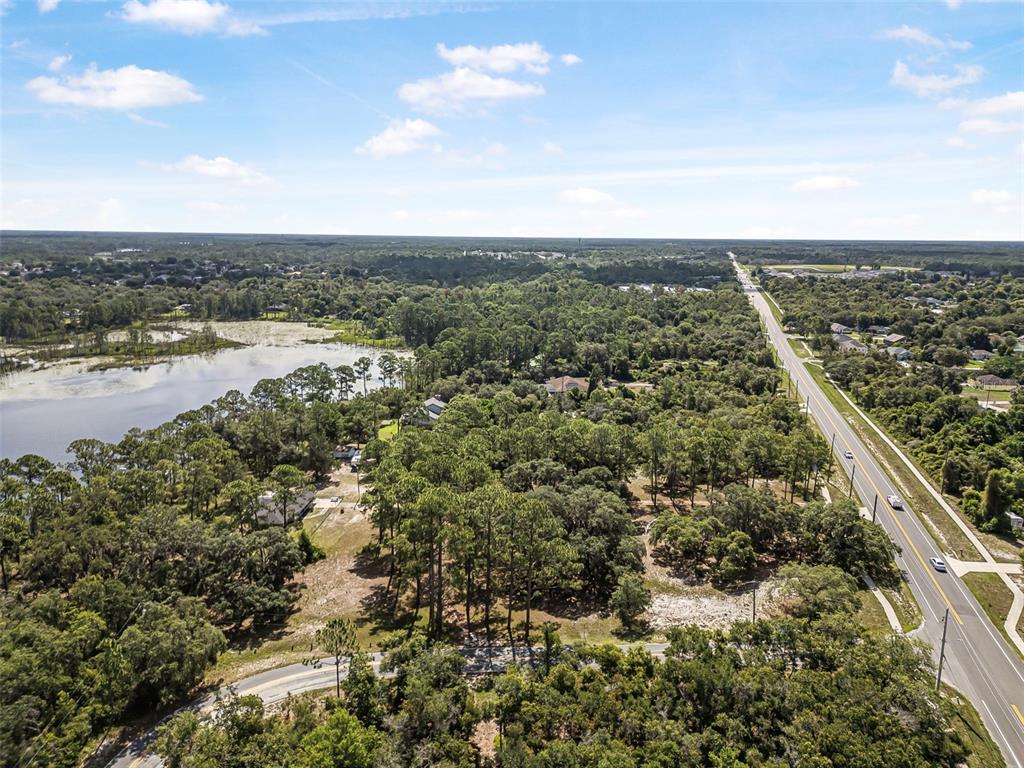 2620 Doyle Road Deltona, FL 32738 - Photo 25 of 54 an aerial view of residential building and ocean