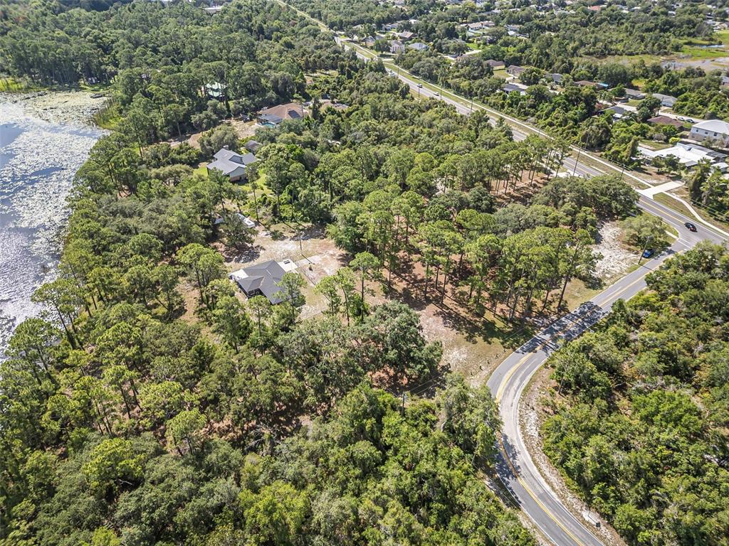 2620 Doyle Road Deltona, FL 32738 - Photo 27 of 54 view of a city with lush green forest
