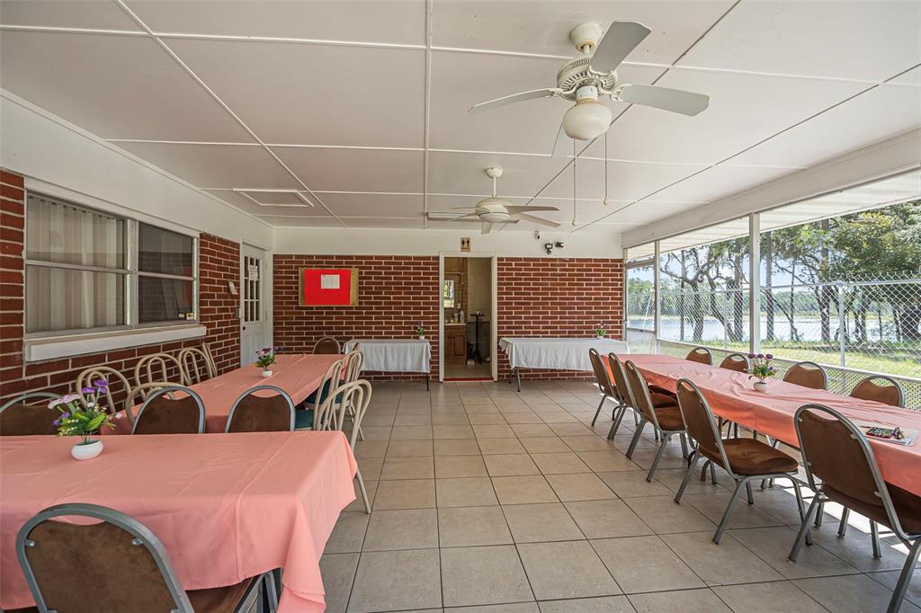2620 Doyle Road Deltona, FL 32738 - Photo 32 of 54 a view of a dining room with furniture window and outside view
