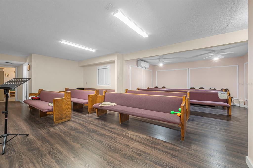 2620 Doyle Road Deltona, FL 32738 - Photo 4 of 54 a living room with furniture and a wooden floor