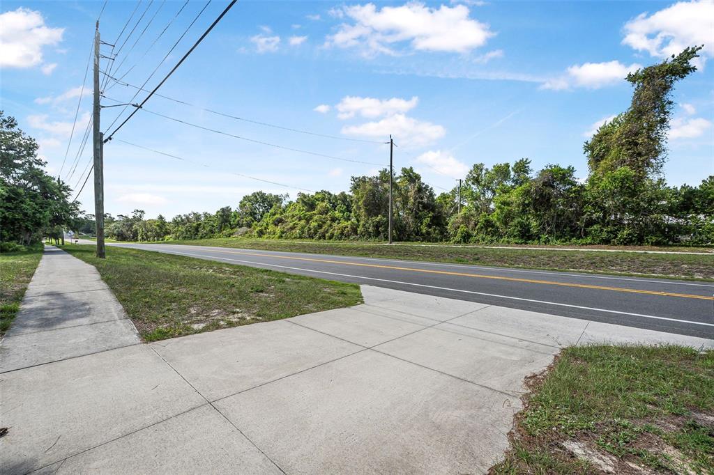 2620 Doyle Road Deltona, FL 32738 - Photo 48 of 54 a view of a garden
