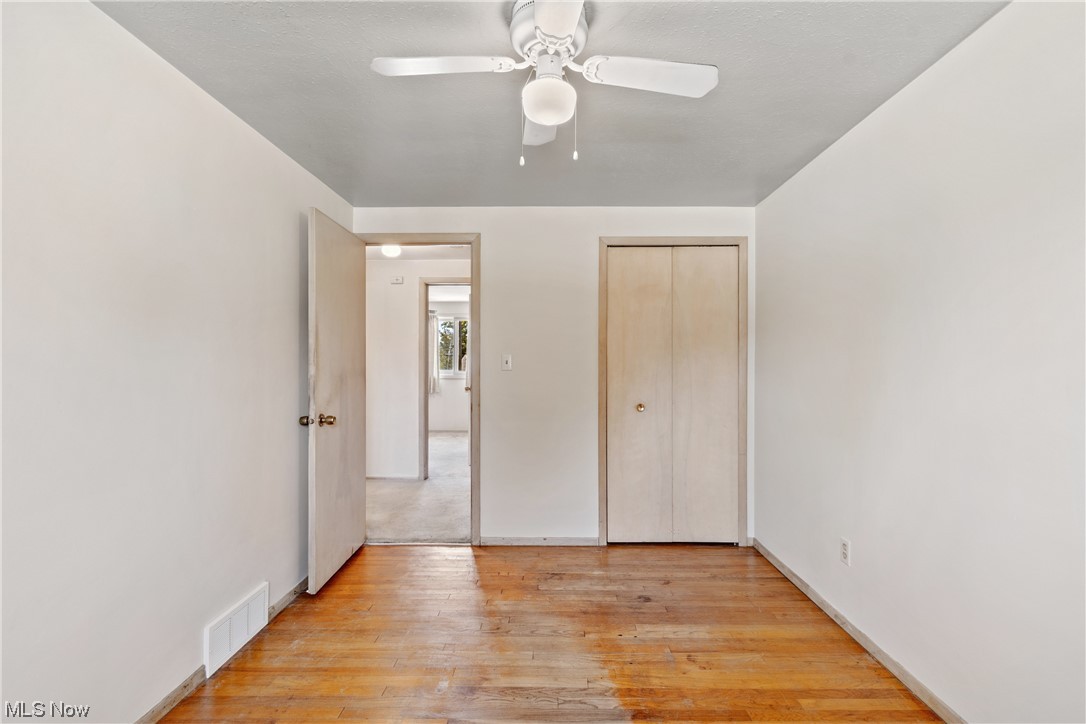 1722 Chelmsford Road Cleveland, OH 44124 - Photo 21 of 34 Hardwood floored bedroom featuring ceiling fan