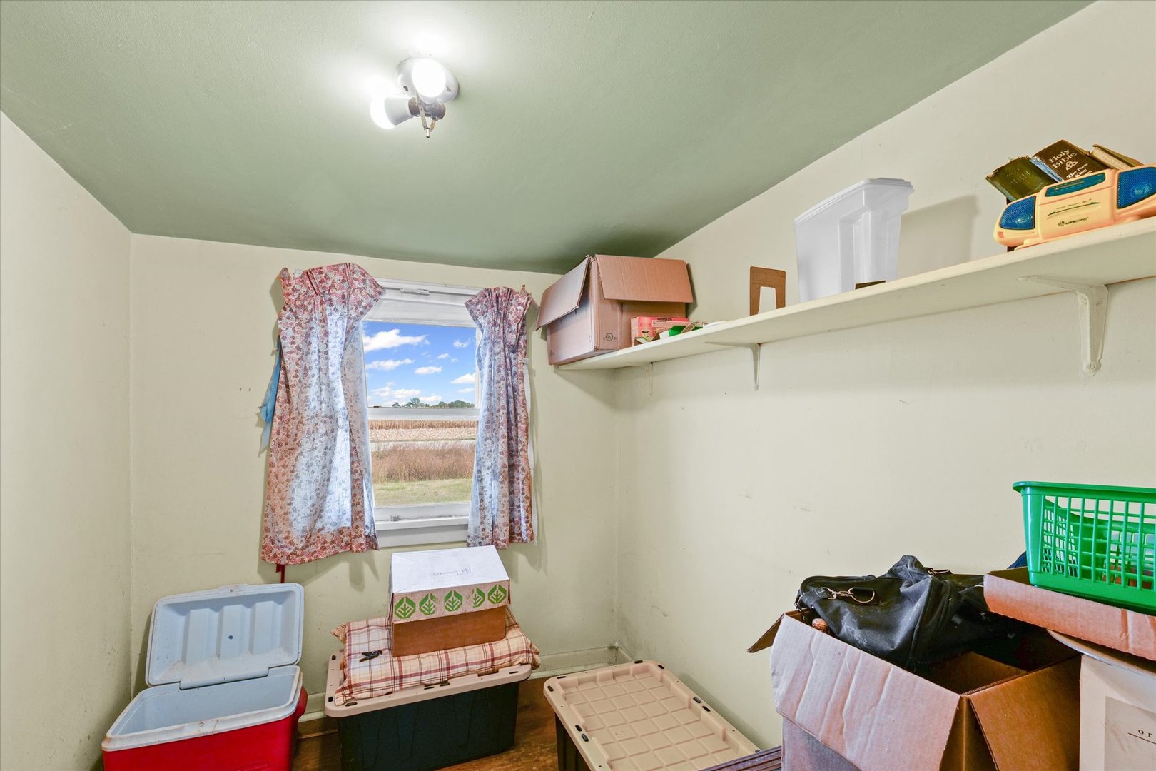 139 North 1500E Road Paxton, IL 60957 - Photo 14 of 49 a bedroom with furniture and a window