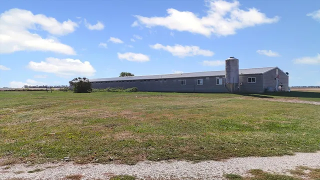 a view of a lake with a yard
