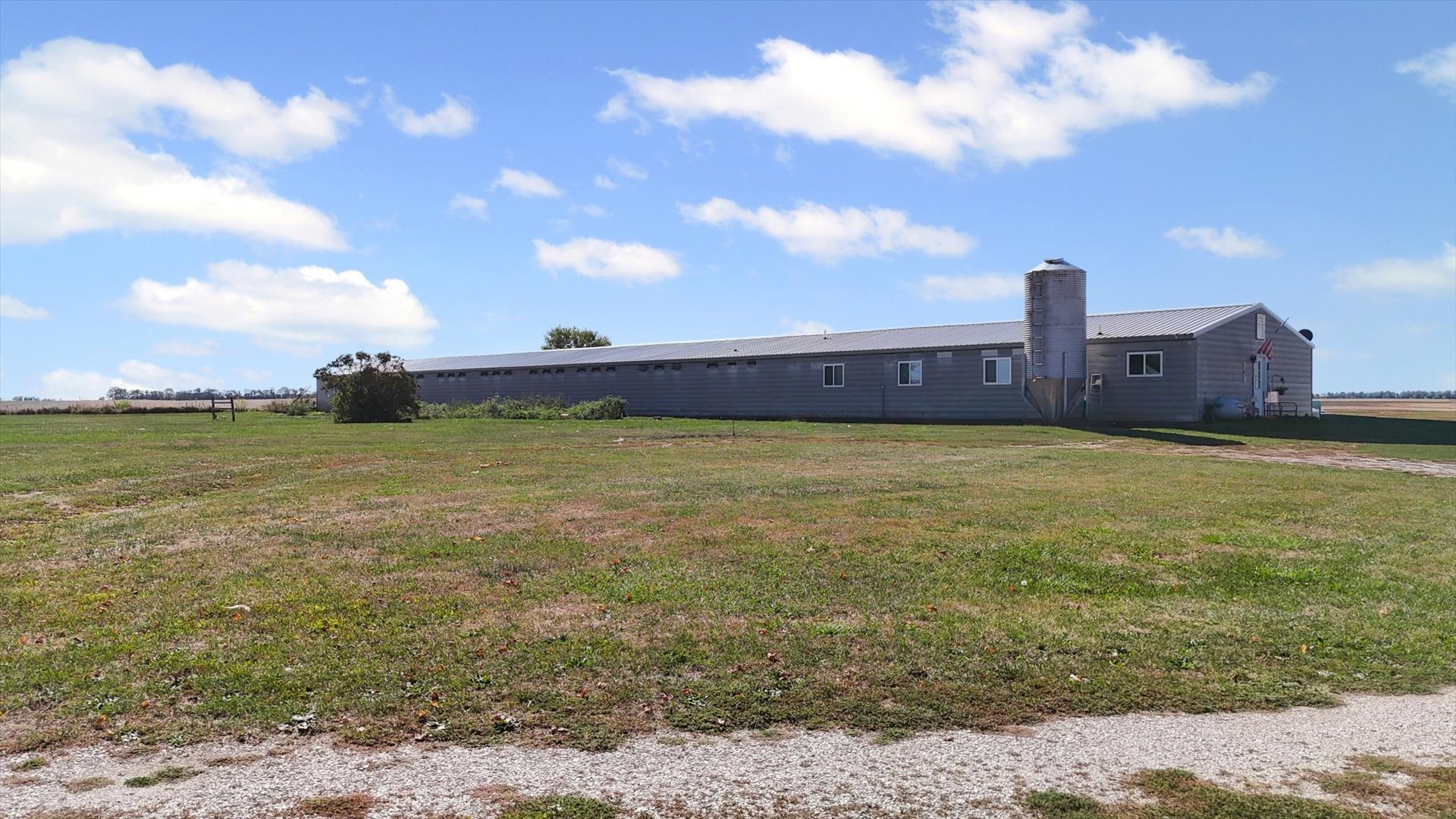 139 North 1500E Road Paxton, IL 60957 - Photo 28 of 49 a view of a lake with a yard