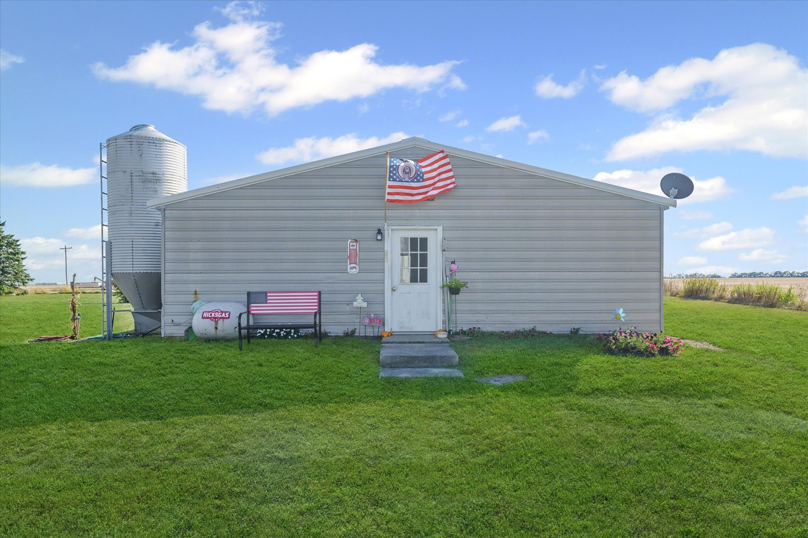 139 North 1500E Road Paxton, IL 60957 - Photo 31 of 49 a view of a house with a backyard