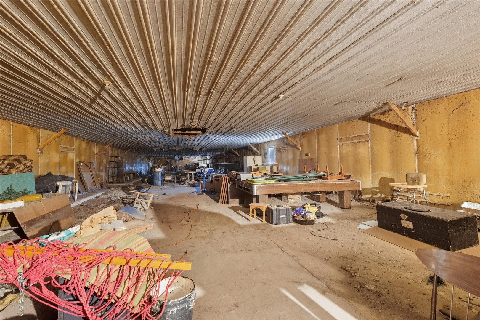 139 North 1500E Road Paxton, IL 60957 - Photo 42 of 49 a view of a patio with table and chairs with wooden floor