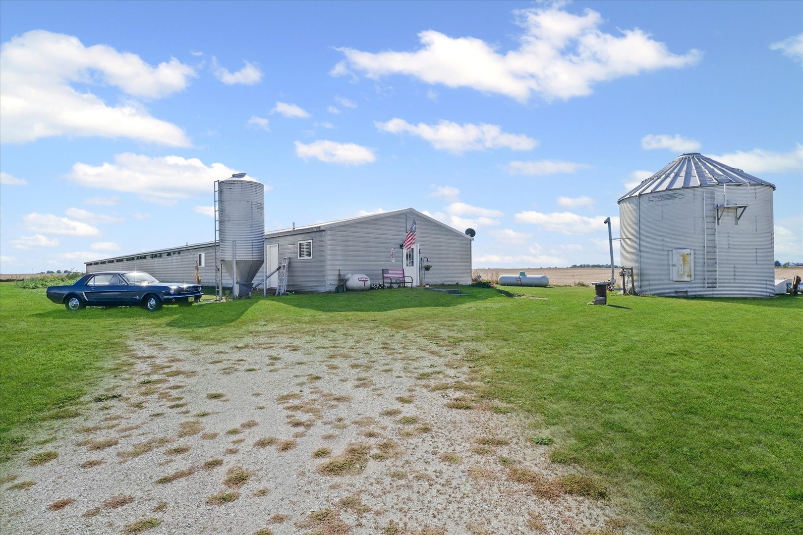 139 North 1500E Road Paxton, IL 60957 - Photo 45 of 49 a view of a house with a yard and sitting area