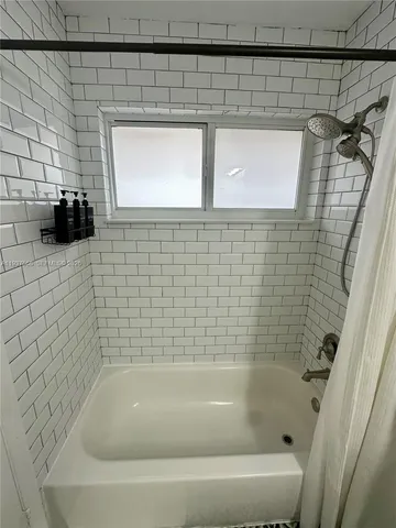 a bathroom with a bathtub