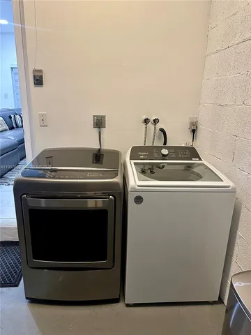 a stove top oven sitting inside of a kitchen