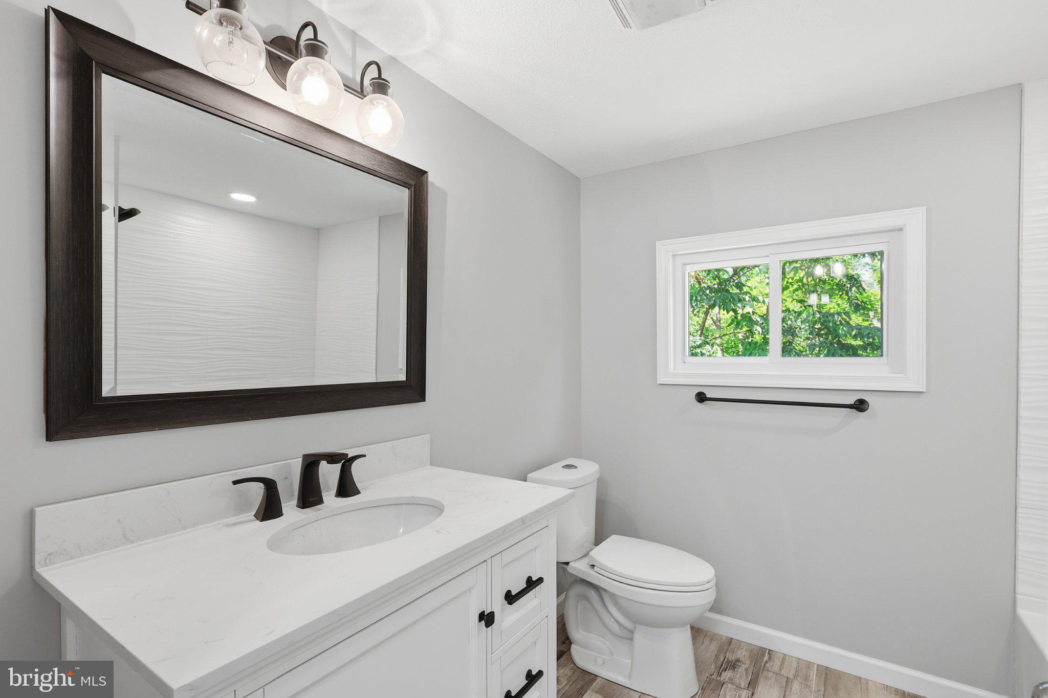 125 Ashland Drive Ridgeley, WV 26753 - Photo 13 of 41 Modern bathroom with natural light.
