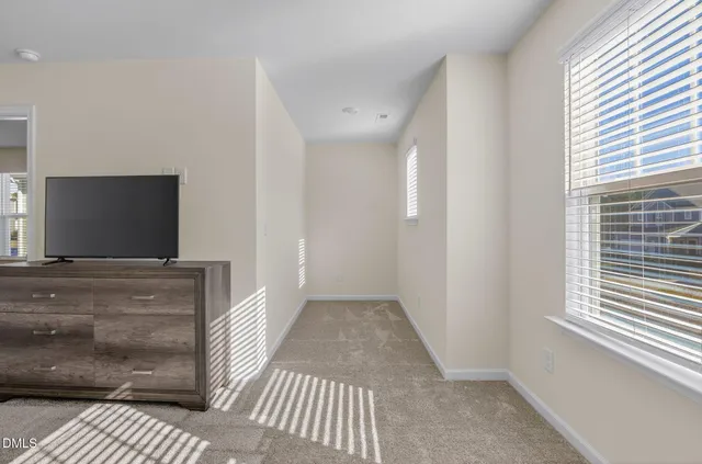 a workspace with furniture and window