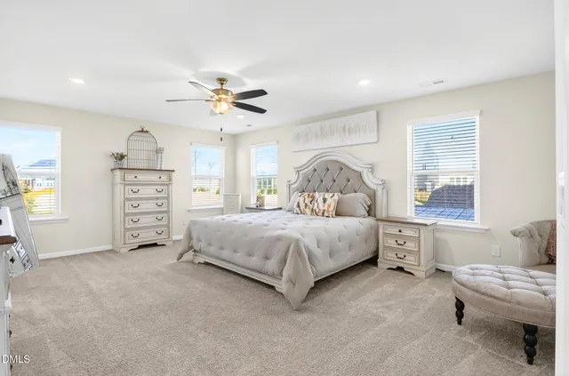 a bathroom with a shower sink and mirror