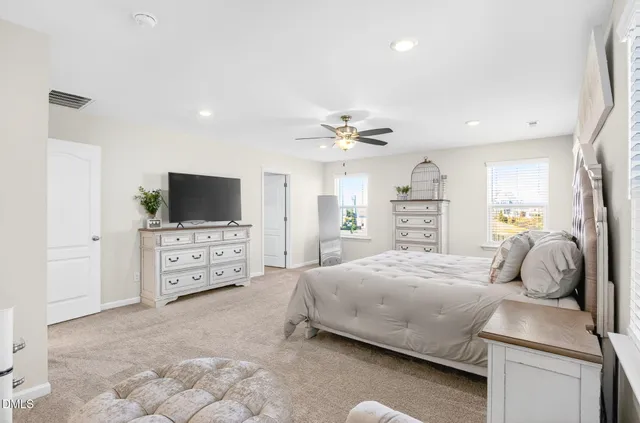 a bathroom with a sink vanity and a mirror