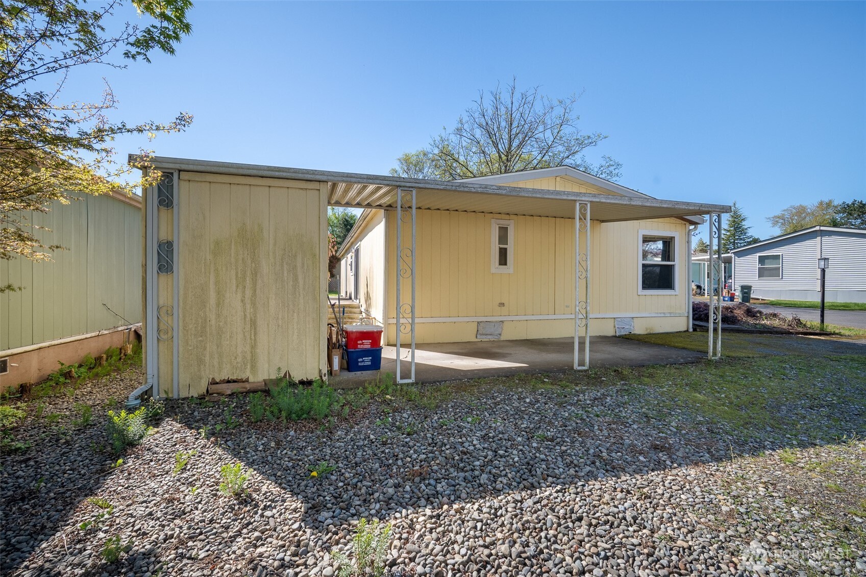 2350 Douglas Road, Unit 37 Ferndale, WA 98248 - Photo 11 of 40 a view of a house with a backyard and a garden