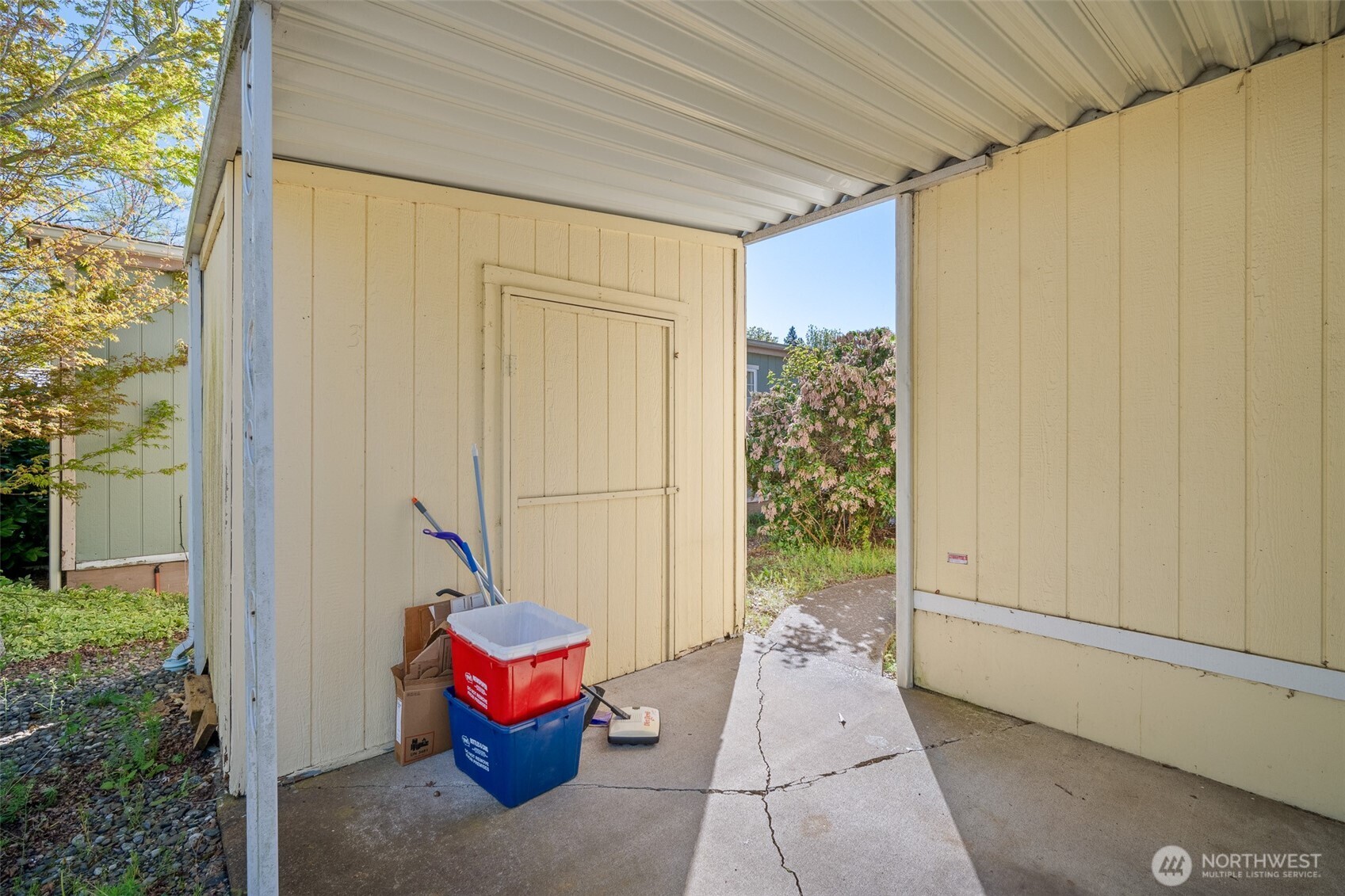 2350 Douglas Road, Unit 37 Ferndale, WA 98248 - Photo 12 of 40 a view of a porch with potted plants