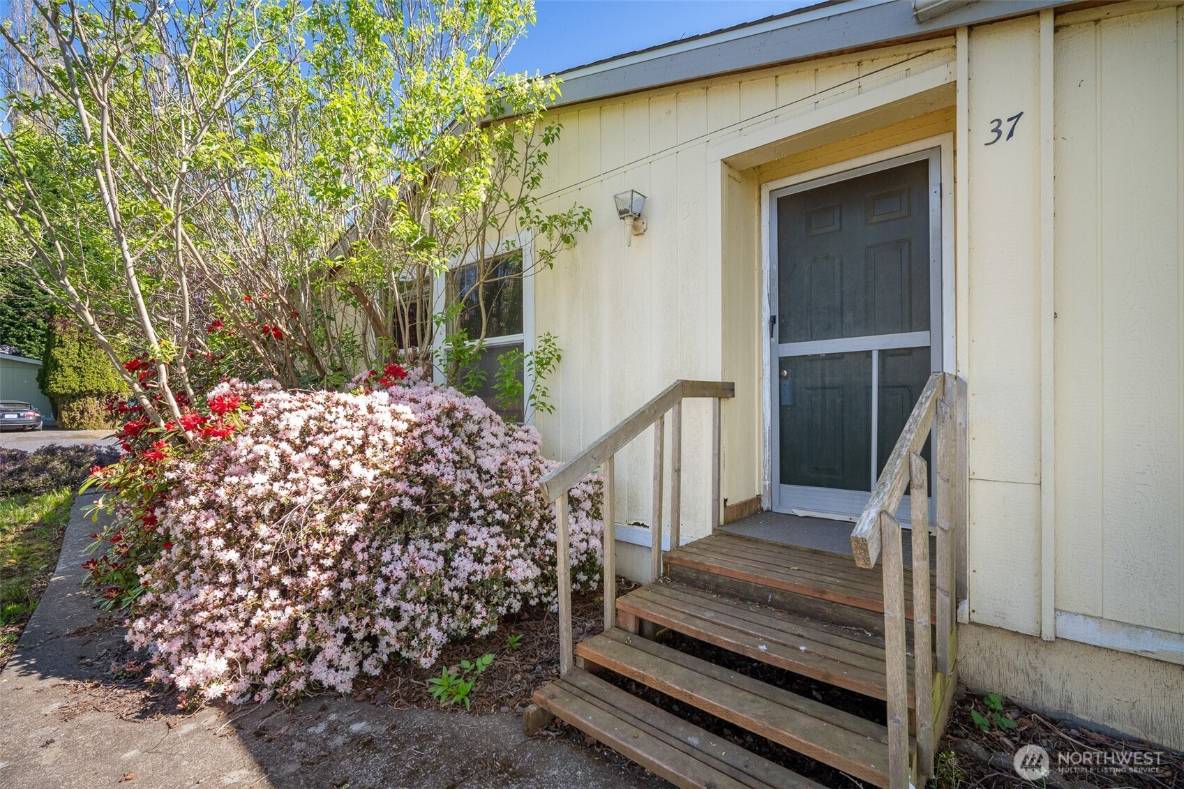 2350 Douglas Road, Unit 37 Ferndale, WA 98248 - Photo 15 of 40 a view of a wooden door of the house