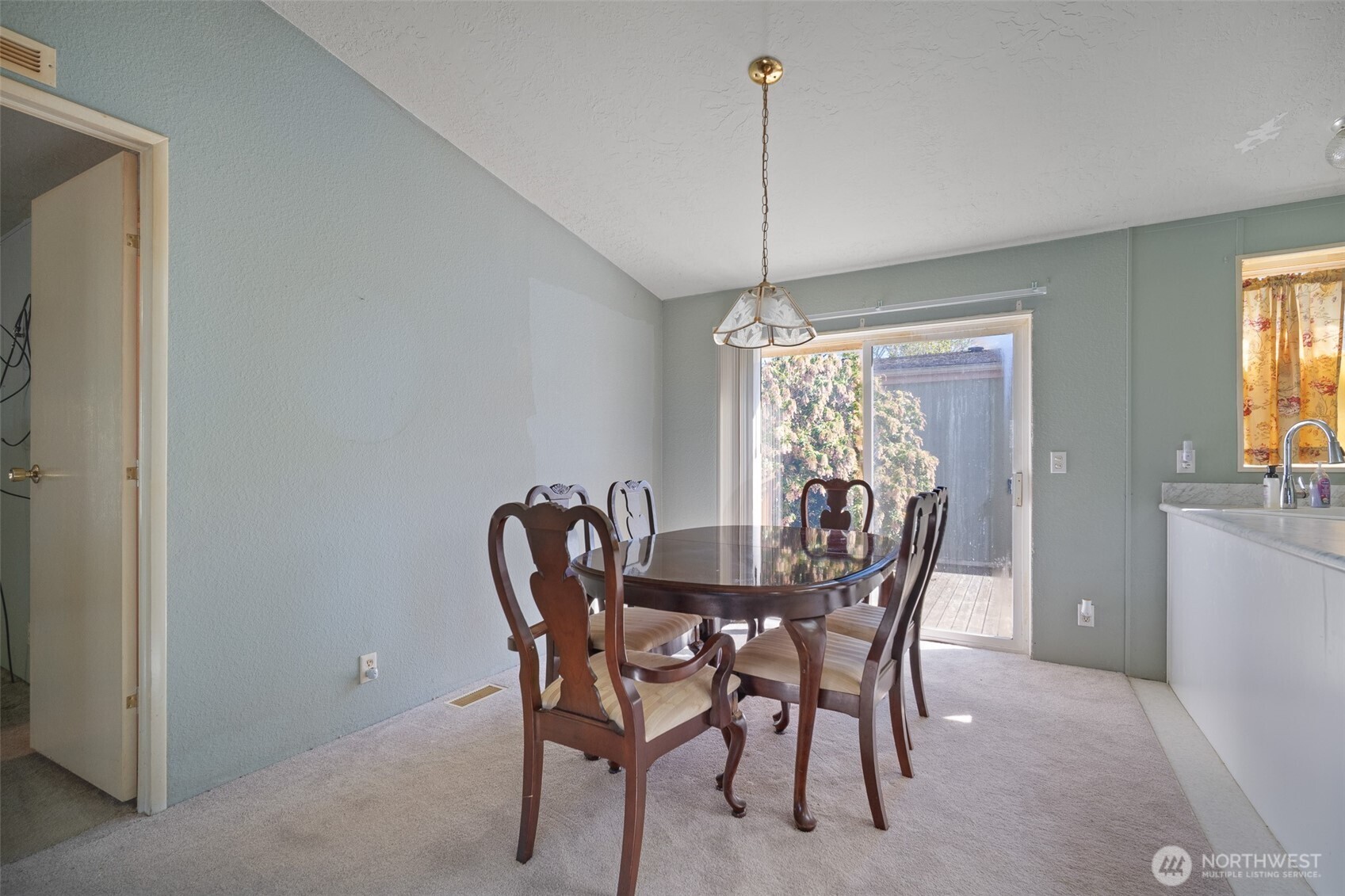 2350 Douglas Road, Unit 37 Ferndale, WA 98248 - Photo 21 of 40 a view of a dining room with furniture window and wooden floor