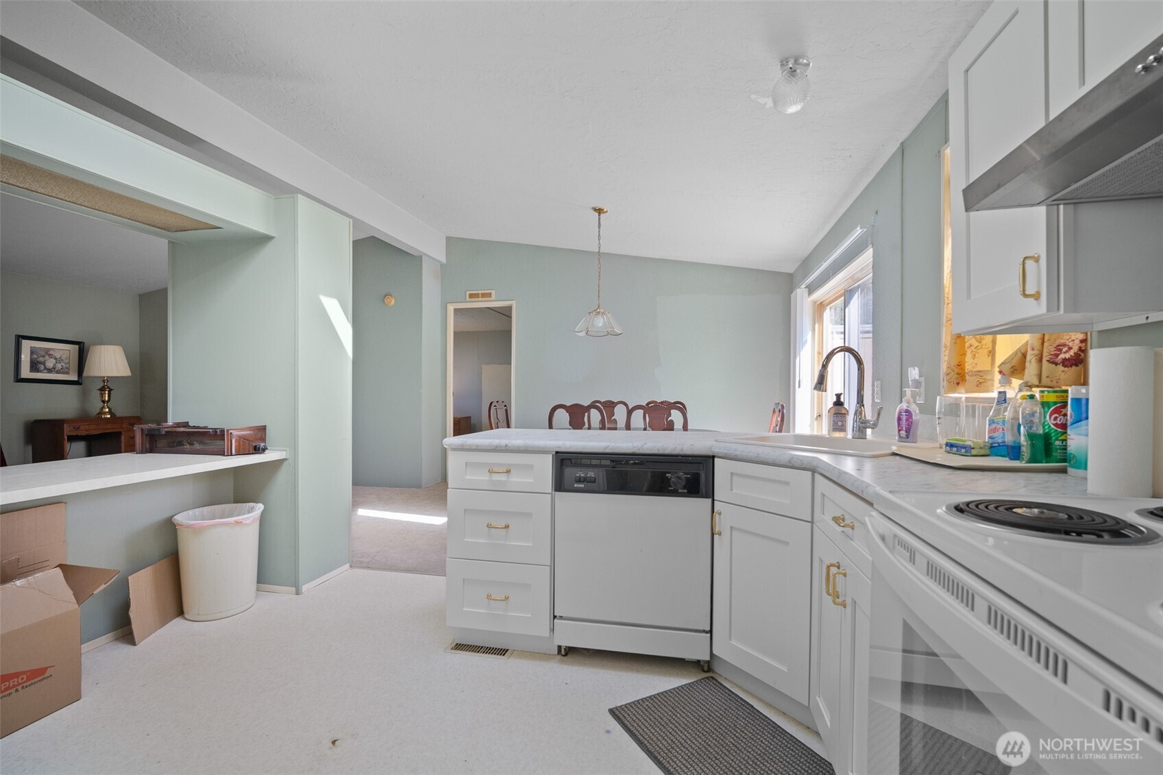 2350 Douglas Road, Unit 37 Ferndale, WA 98248 - Photo 25 of 40 a kitchen with cabinets a sink and appliances