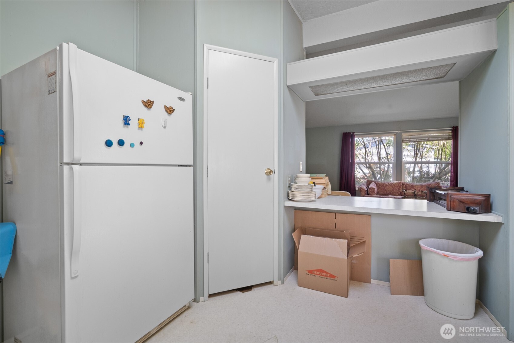2350 Douglas Road, Unit 37 Ferndale, WA 98248 - Photo 26 of 40 a white refrigerator freezer sitting inside of a kitchen