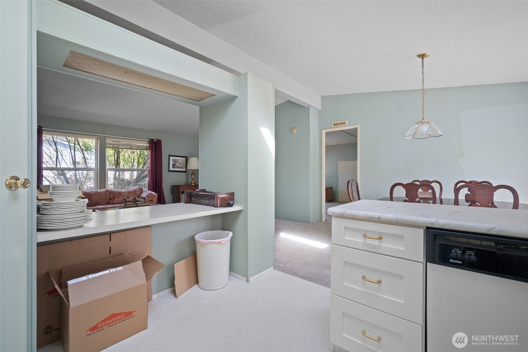 2350 Douglas Road, Unit 37 Ferndale, WA 98248 - Photo 29 of 40 a kitchen with a sink a stove and cabinets