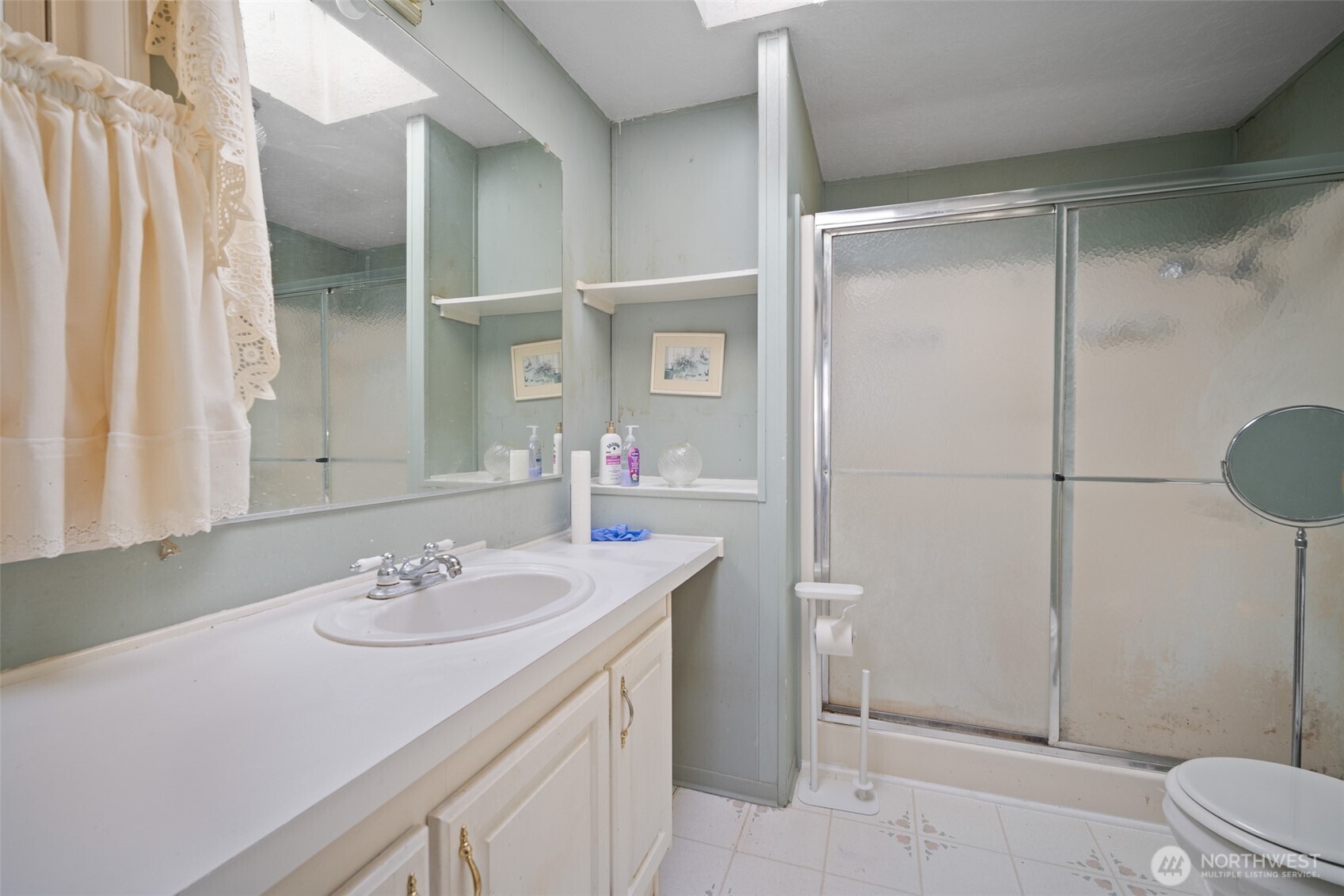 2350 Douglas Road, Unit 37 Ferndale, WA 98248 - Photo 35 of 40 a bathroom with a sink toilet and shower