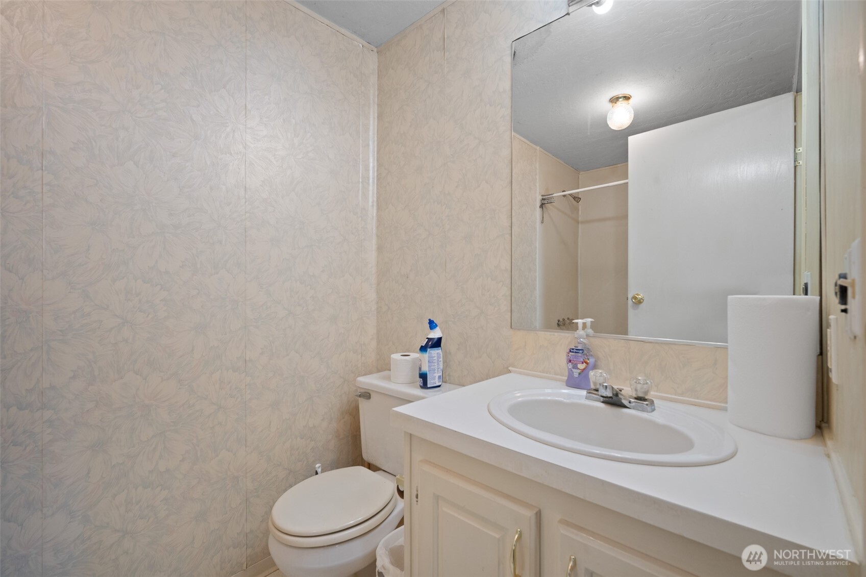 2350 Douglas Road, Unit 37 Ferndale, WA 98248 - Photo 36 of 40 a bathroom with a sink toilet and a mirror