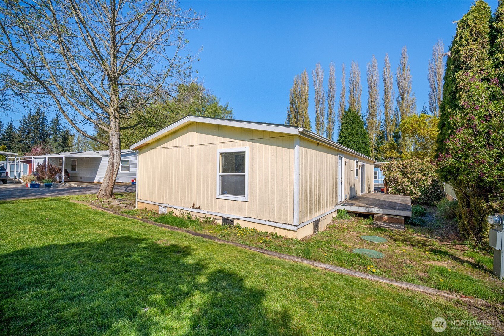 2350 Douglas Road, Unit 37 Ferndale, WA 98248 - Photo 6 of 40 a view of a back yard of the house