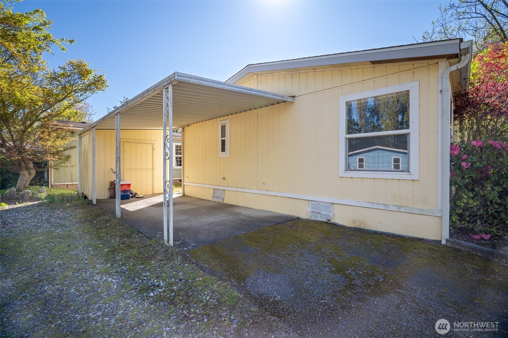2350 Douglas Road, Unit 37 Ferndale, WA 98248 - Photo 10 of 40 a view of a house with a backyard