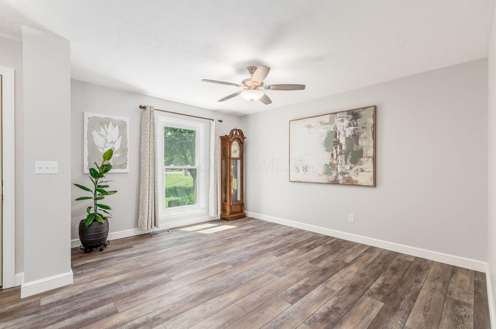 9471 Concord Road Powell, OH 43065 - Photo 4 of 40 LVP flooring throughout the main level
