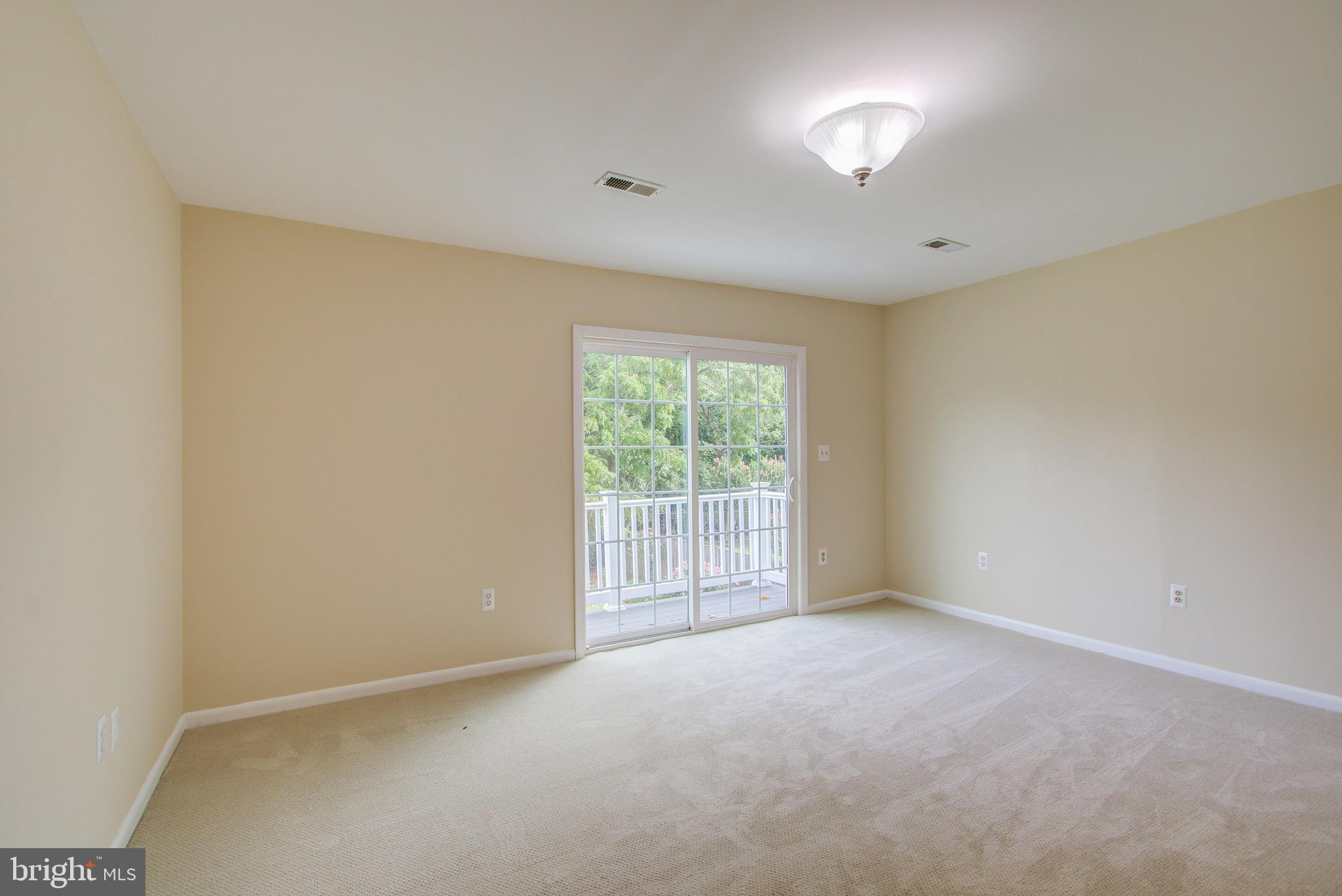 1526 Ridgely Drive Edgewater, MD 21037 - Photo 27 of 30 Second floor bedroom with balcony