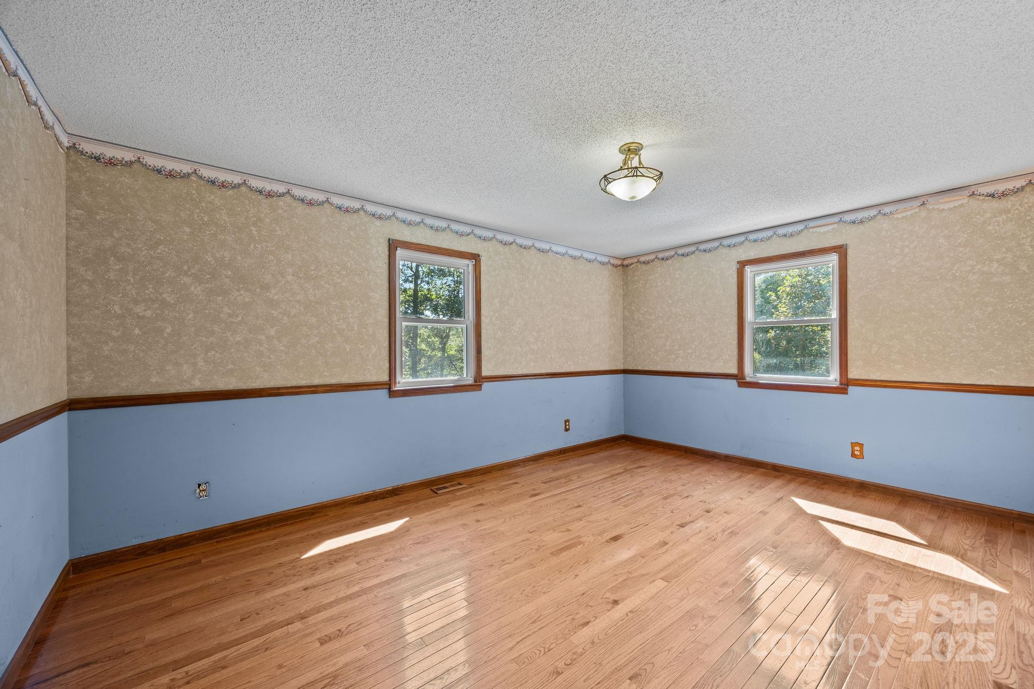 473 Eli Capps Road Zirconia, NC 28790 - Photo 24 of 37 a view of an empty room with a window