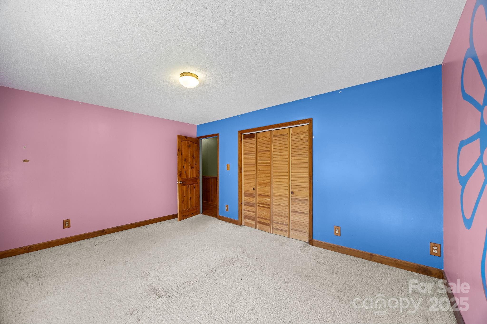 473 Eli Capps Road Zirconia, NC 28790 - Photo 27 of 37 a view of an empty room with a window