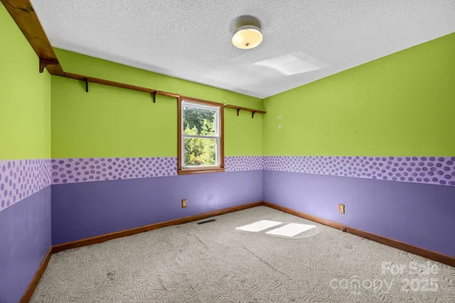 a view of a building with an empty space