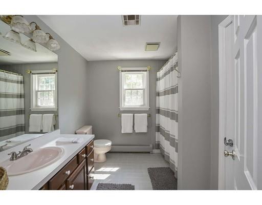 34 Century Drive Canton, MA 02021 - Photo 16 of 21 a bathroom with a sink mirror and a toilet