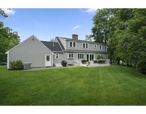 34 Century Drive Canton, MA 02021 - Photo 20 of 21 a front view of a house with a garden