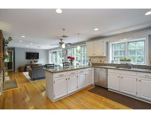 34 Century Drive Canton, MA 02021 - Photo 6 of 21 a kitchen with kitchen island granite countertop lots of counter top space and stainless steel appliances